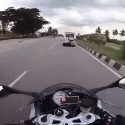 A motorcyclist comes close to disaster