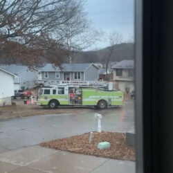 Firetruck Spins Out of Control on Ice and Crashes Into Parked Car